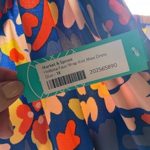 A gorgeous wrap dress from Stitch Fix. NWT & never worn. Smoke & pet free.